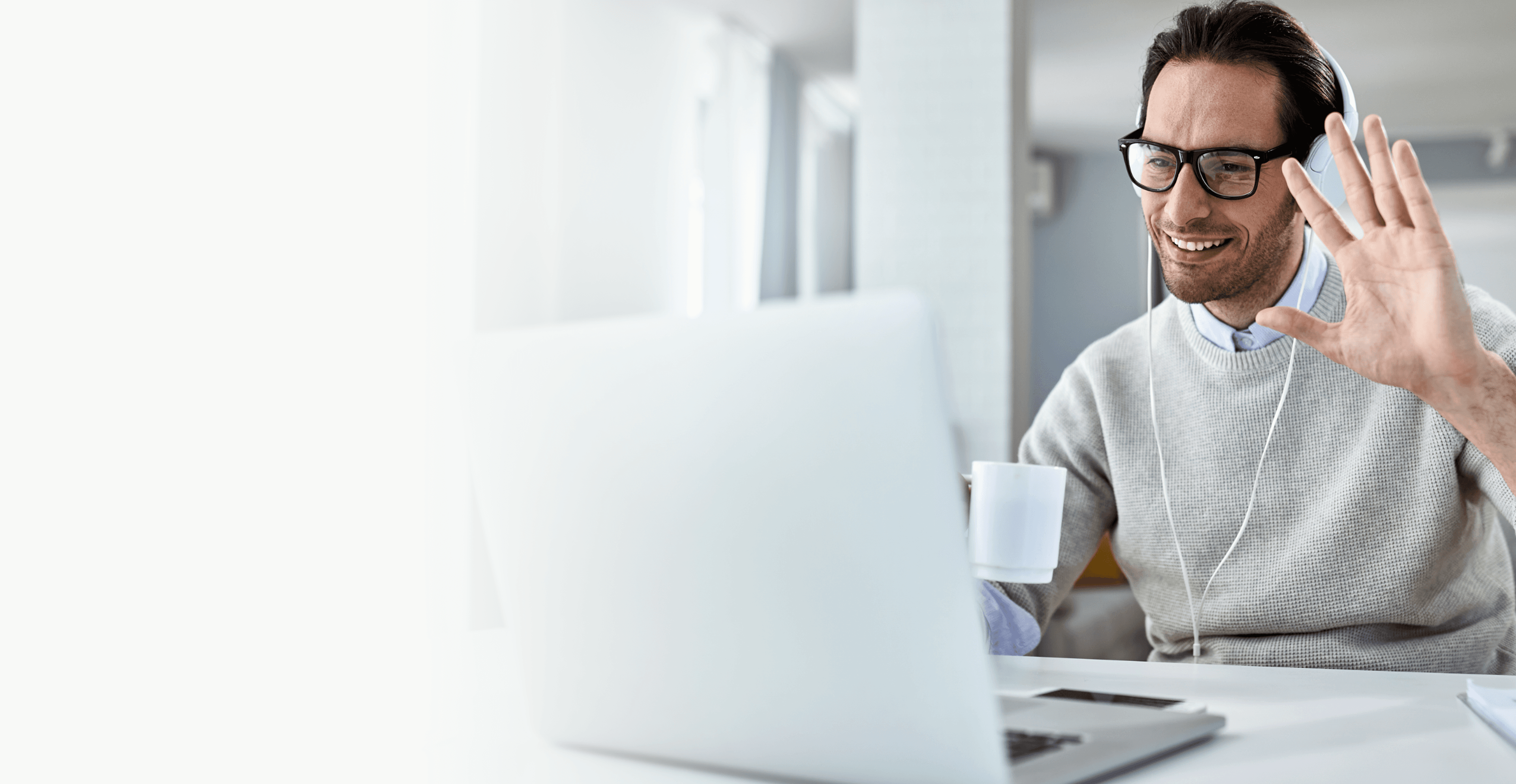 Agent waving on a video call